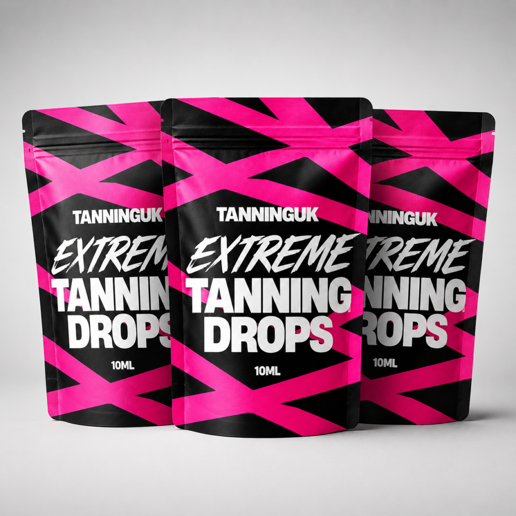 Three black and pink pouches of Extreme Tanning Drops.